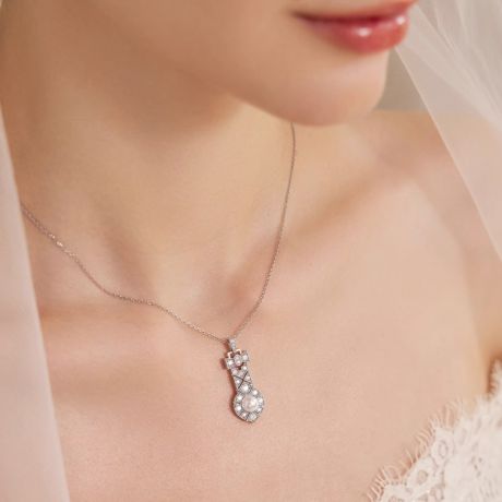 Ciondolo Art Déco in oro bianco e perle Akoya AAA - Geometria Preziosa